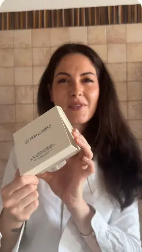 A satisfied customer takes a selfie with the product