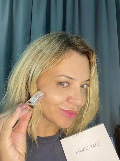 A satisfied customer takes a selfie with the product