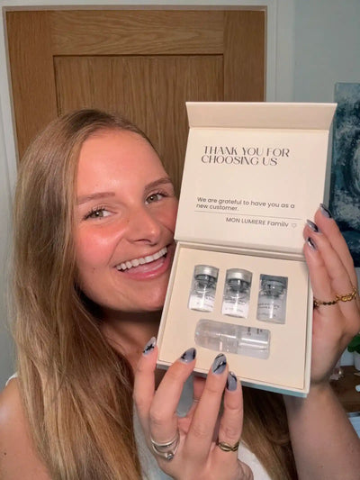 A satisfied customer takes a selfie with the product